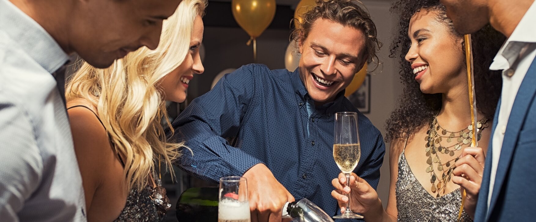 A group of people celebrating with sparkling wine