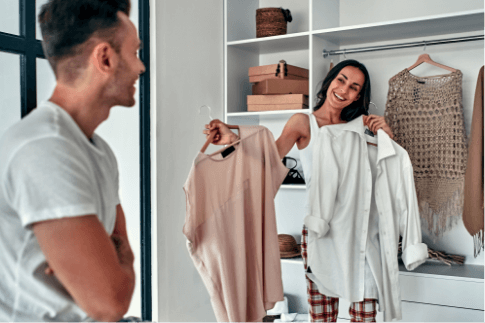 couple folding laundry