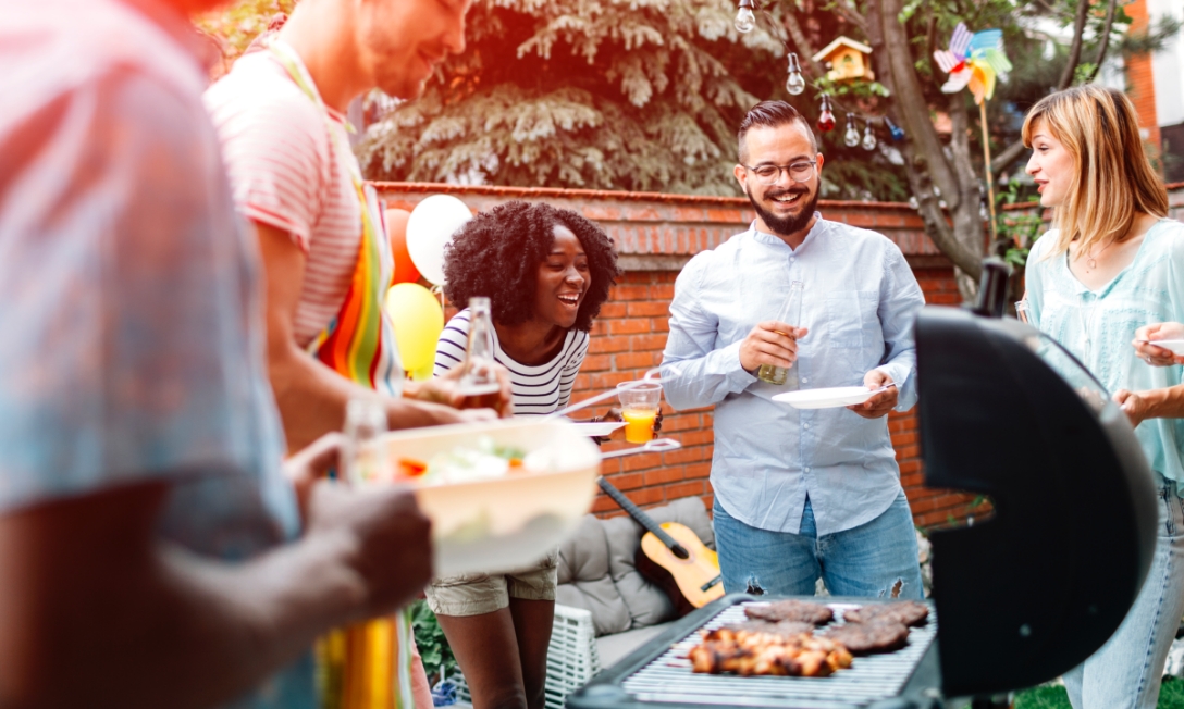  people enjoying burgers 