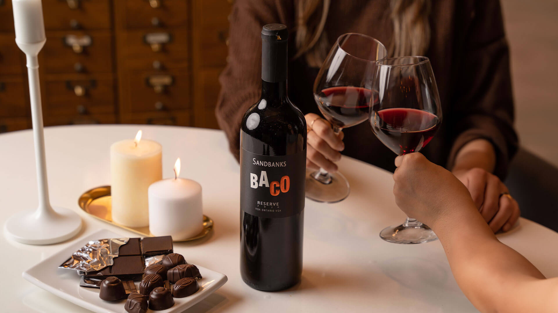 Sandbanks Baco Reserve red wine paired with a platter of chocolates.