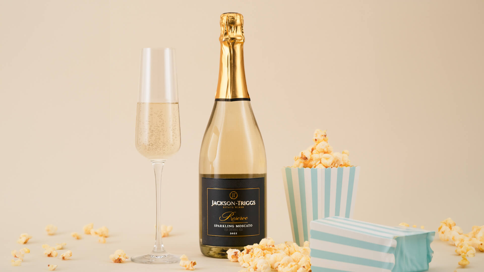 Jackson-Triggs Reserve Sparkling Moscato with a side of popcorn.