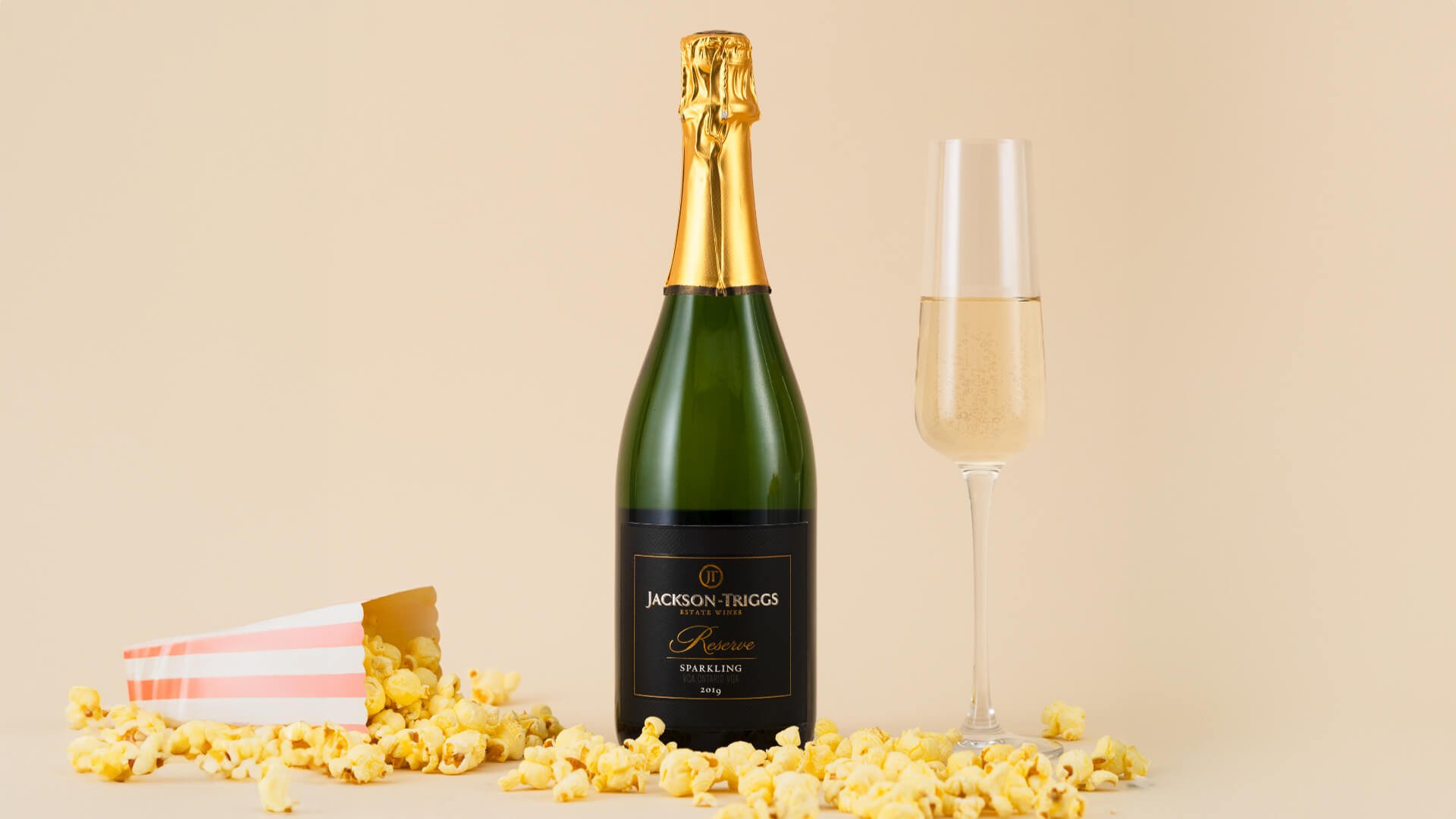  Jackson-Triggs Reserve Sparkling wine with spilled popcorn.