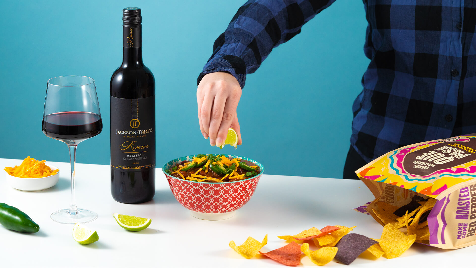 A bottle of Jackson-Triggs Reserve Meritage being served with chili.