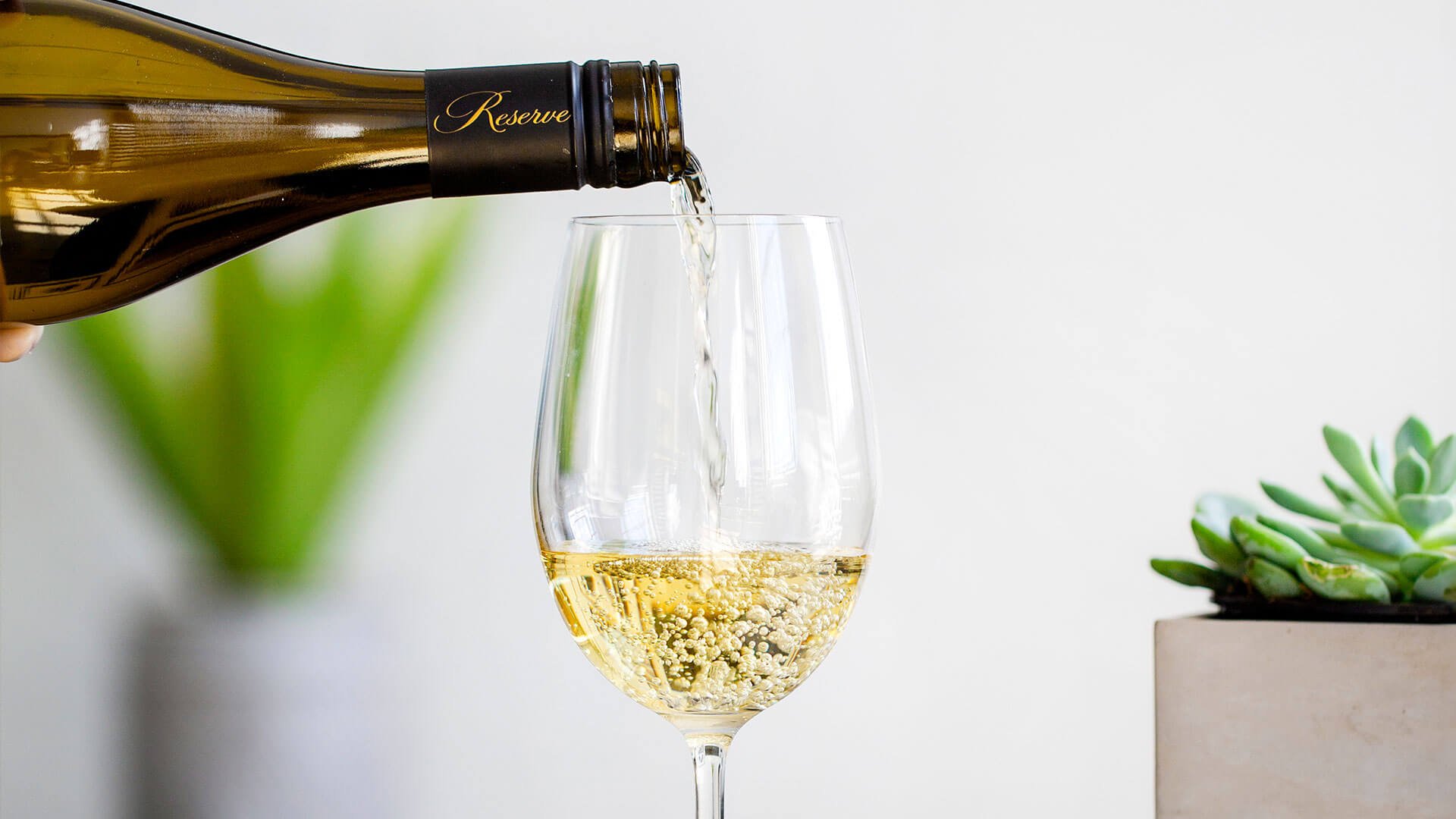 Pouring of Jackson- Triggs Grand Reserve Sauvignon Blank White Wine.